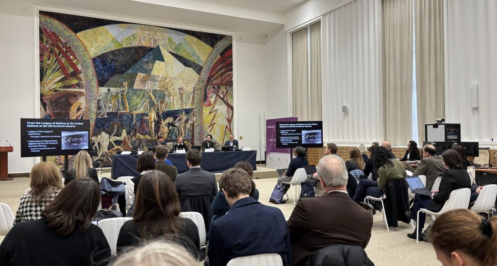 Participants at the META-UN launch conference watch a panel discussion.