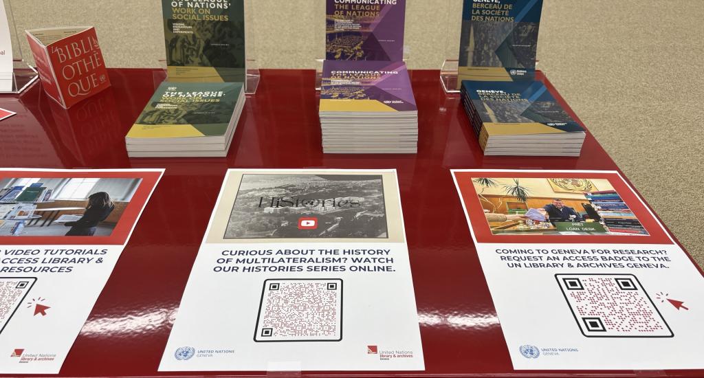 This photo shows publications and resources on display on a table, as part of the META-UN launch conference.