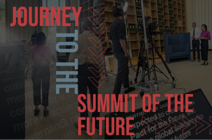 This is the image for Episode 0 of the Journey to the Summit of the Future. It shows the behind the scenes process of filming a video. Two hosts are talking to the camera. 