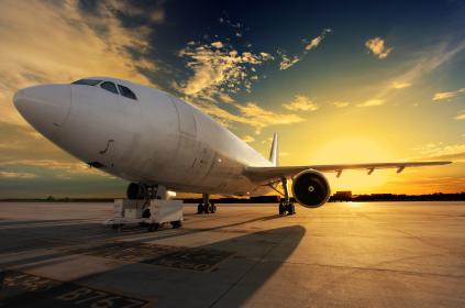 Airplane with a sunset in the background