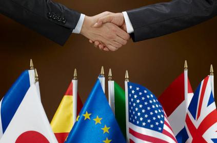 Picture of two individuals shaking hands