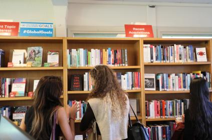 Users browse books in the Main Reading Room.